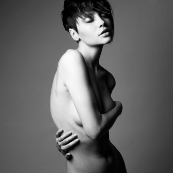 Portrait of nude sensual woman with elegant hairstyle