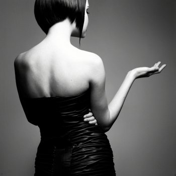 Black and white art photo. Elegant lady with stylish short hairstyle.