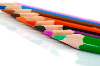 Colored pencils lined up -Shallow depth of field