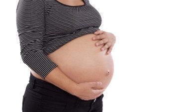 Beautiful pregnant on a over white background