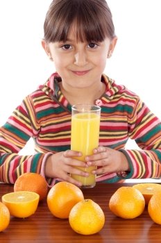Cute child playing with oranges and juice