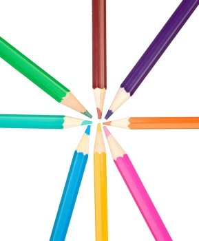 Colored pencils arranged in a star shape isolated on white background