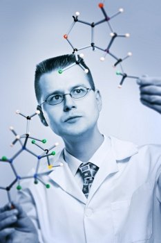 portrait of young chemist, exploring new molecular structures. selective focus, selective toning