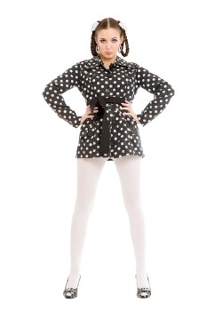 gorgeous young model wearing polka dots coat, studio shot