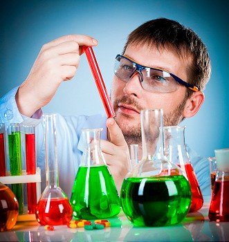 scientist in laboratory with test tubes