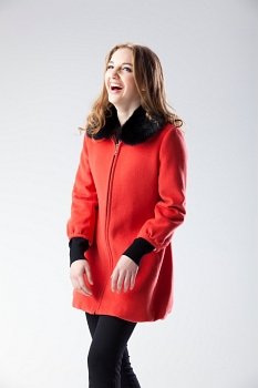 Laughing woman in red coat