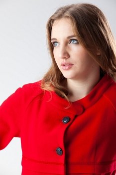 Portrait of woman in red coat