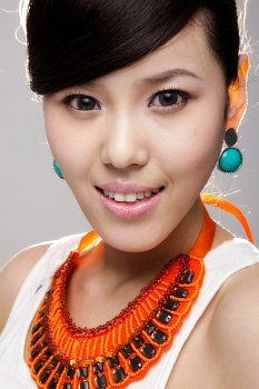 Portrait with orange necklace