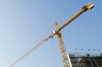 Construction crane on the site