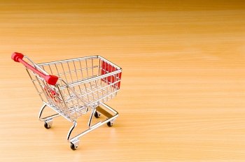 Shopping cart against the  background