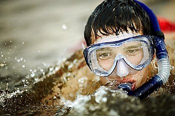 young diver, selective focus on eyes, natural soft light
