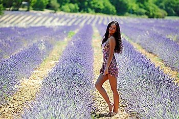 Woman standing on a lavender field