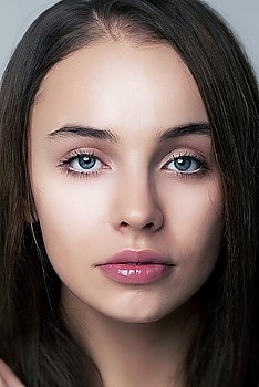 Beautiful face of beauty woman with perfect eyes and lips. Natural makeup