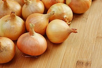 onions on a kitchen cutting board
