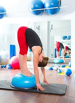 Bosu ball for fitness instructor woman in aerobics gym