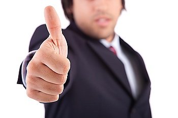 Business man showing thumb up, focus on finger