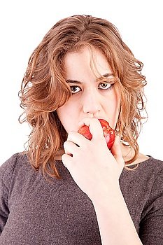 Woman eating red apple, isolated over white