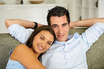 Young couple relaxing on the sofa