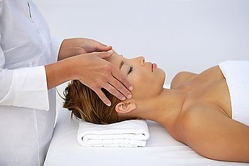 Woman being given head-massage