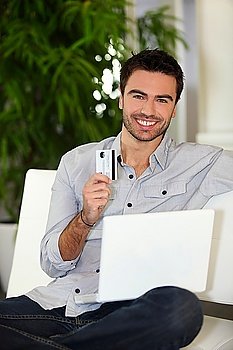 Man using a credit card online