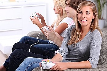 Teenagers playing computer games