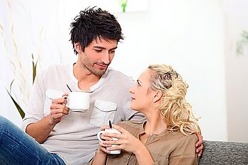 Couple having a cup of coffee together in the morning