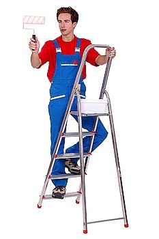 Painter painting whilst up ladder
