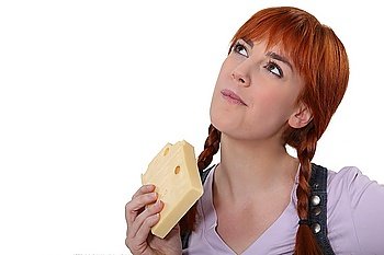 Woman eating block of cheese