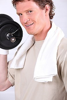a man doing fitness with dumbbell