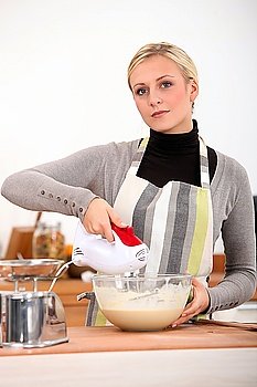 Woman mixing batter