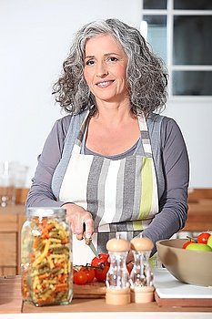 mature woman cooking