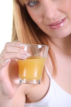 Woman with a glass of orange juice
