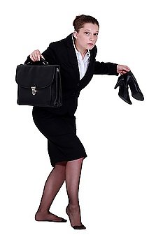 A businesswoman leaving quietly.