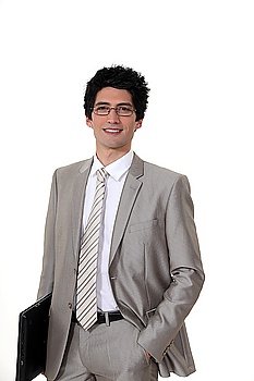 young businessman holding a laptop
