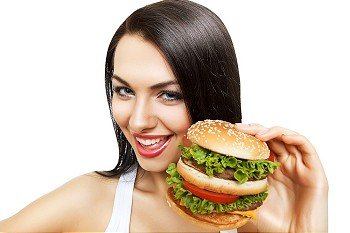 funny girl with hamburger on white background