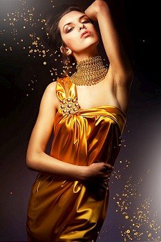 sensual woman in long yellow dress