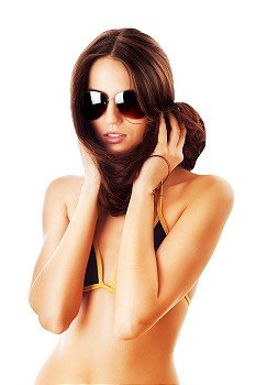 woman in sunglasses and hair around neck on white background