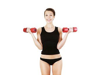 woman with dumbbell on white background