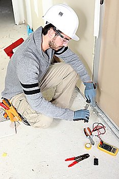 Man repairing house wiring