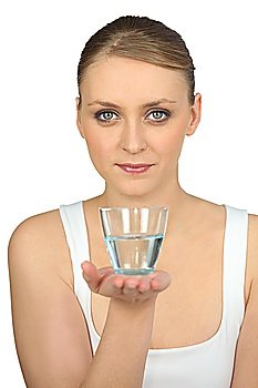 young beautiful blonde handing out glass of water