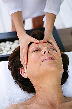 Woman receiving a massage at the spa
