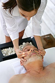 Man enjoying a face massage