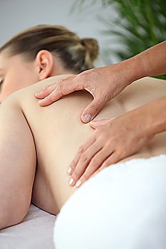 Woman mid back massage