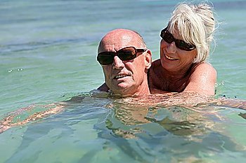 Senior couple in the sea