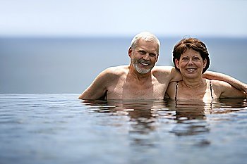 Adult couple in swimming pool