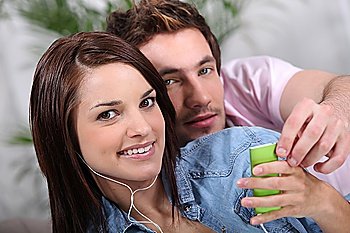 young couple listening music