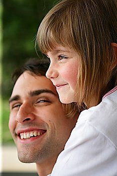Smiling man with cute little girl