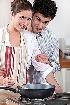 Couple cooking in their kitchen