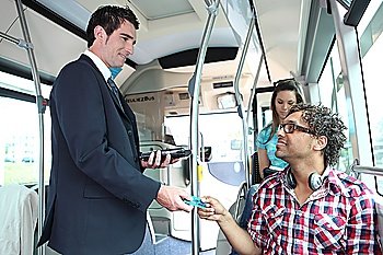 A young controller controlling passengers in a bus.