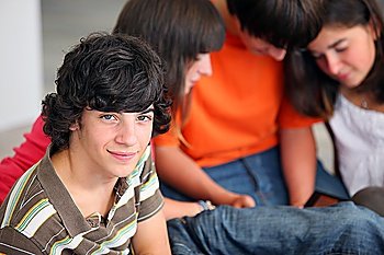 Portrait of teenager with his friends